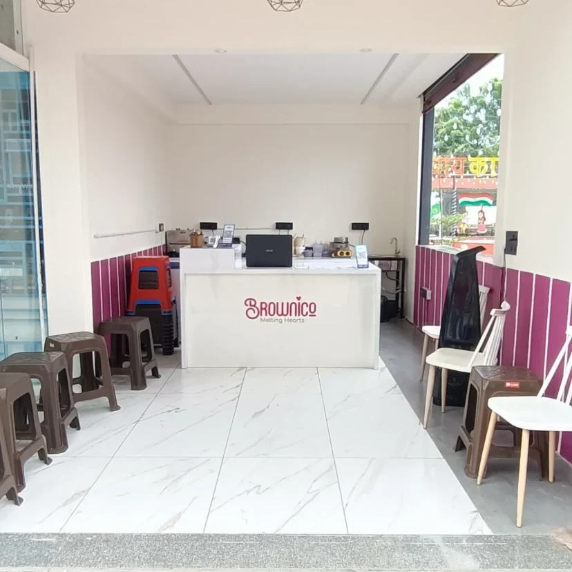 Seating and dessert counter inside Brownico Gota